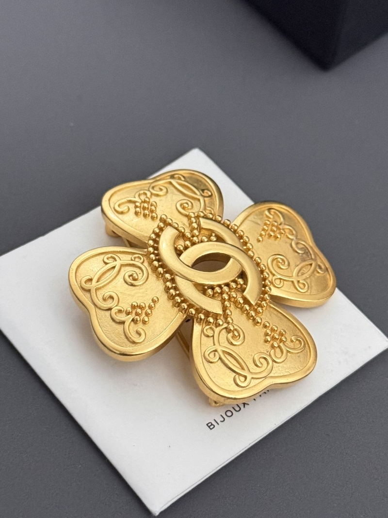 Ch**el brooches